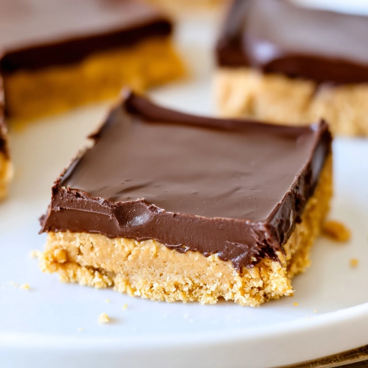 Fudgy No Bake Peanut Butter Bars dusted with sea salt, ready to serve